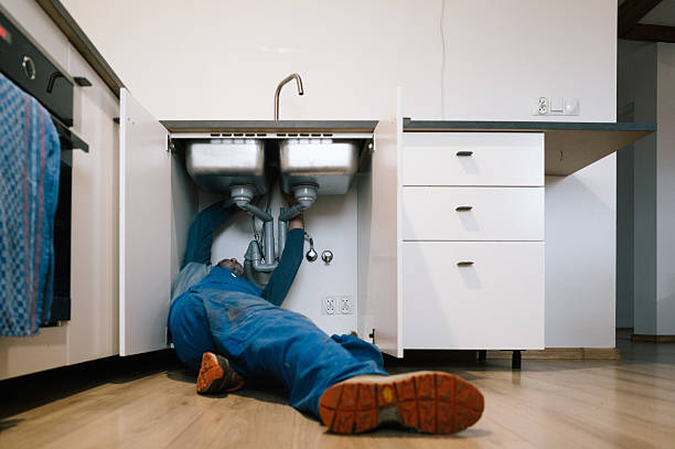 Professional Drain Cleaning technician working in Clinton, MI